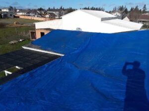 Tarp on roof